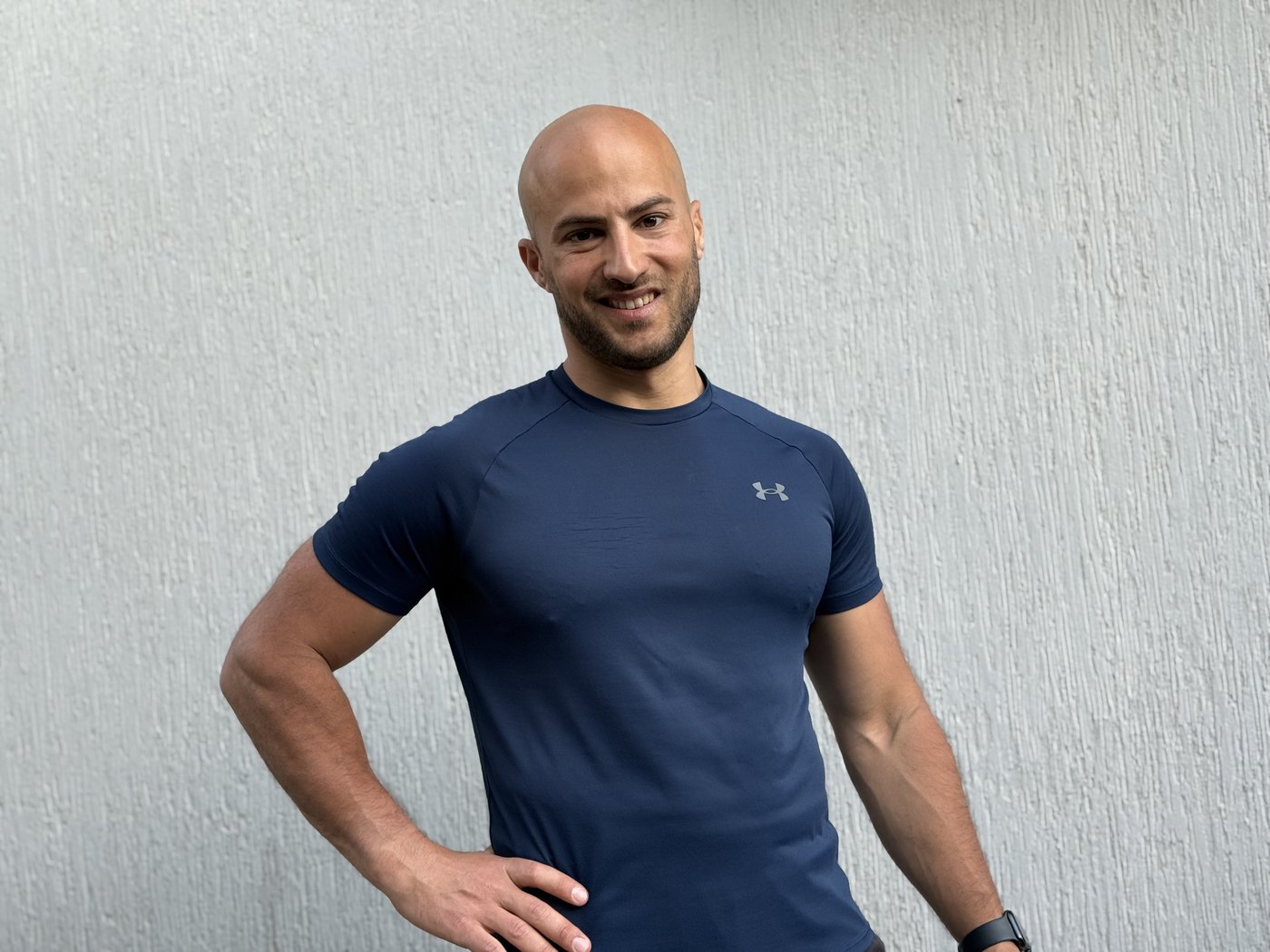 Portrait of Ruben Veres in a navy training shirt.